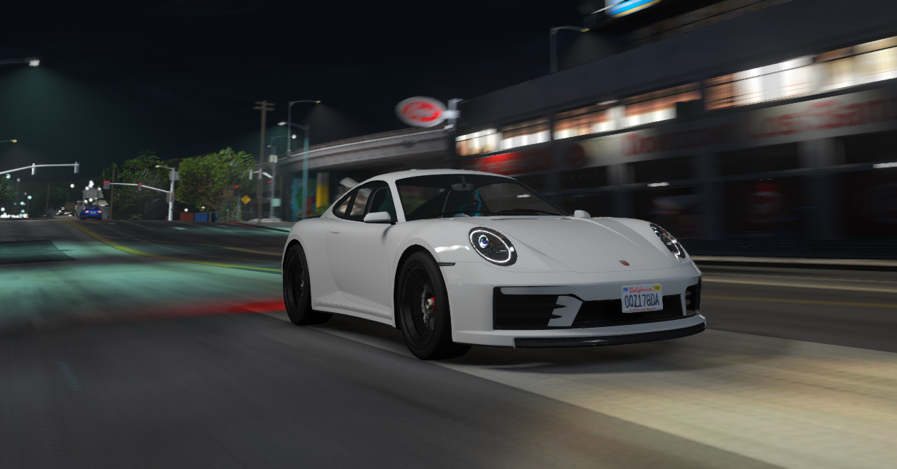 White Porsche Sports Car at Night