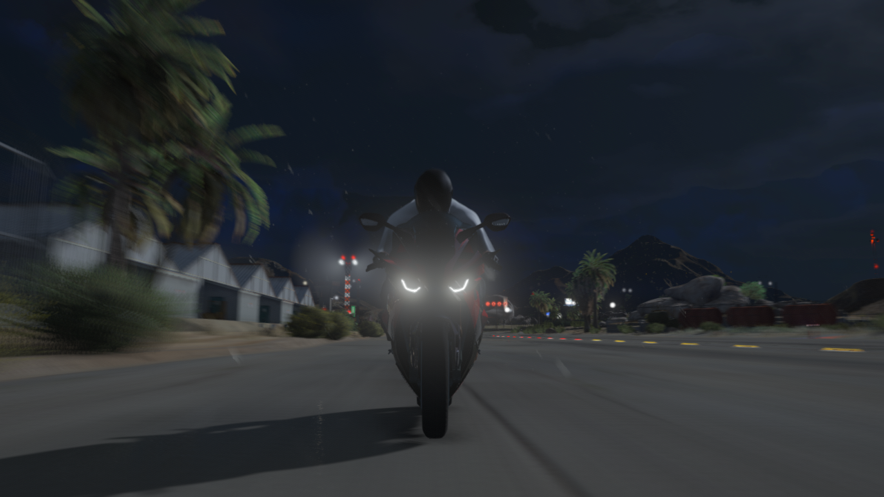 Motorcycle Rider at Night